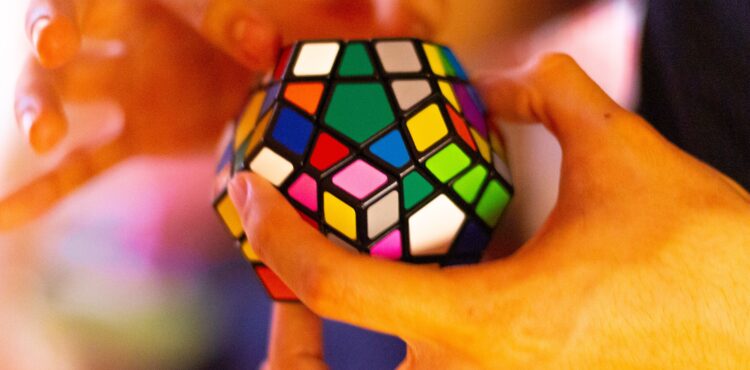 IN WHAT WAYS DOES SOLVING A RUBIK’S CUBE AID CHILDREN IN ENHANCING THEIR MEMORY SKILLS?